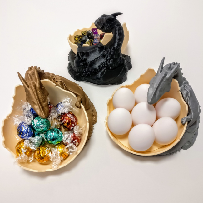 Dragon-shaped bowls holding candy and eggs, versatile decor items that add a mythical touch to any space.