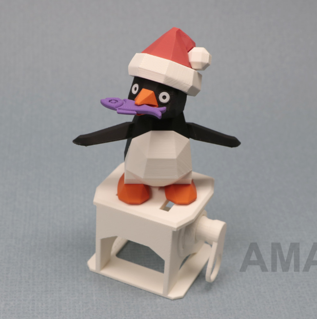 Mechanical penguin automaton with a crank, waddling motion, and Santa hat, a playful and interactive 3D print.