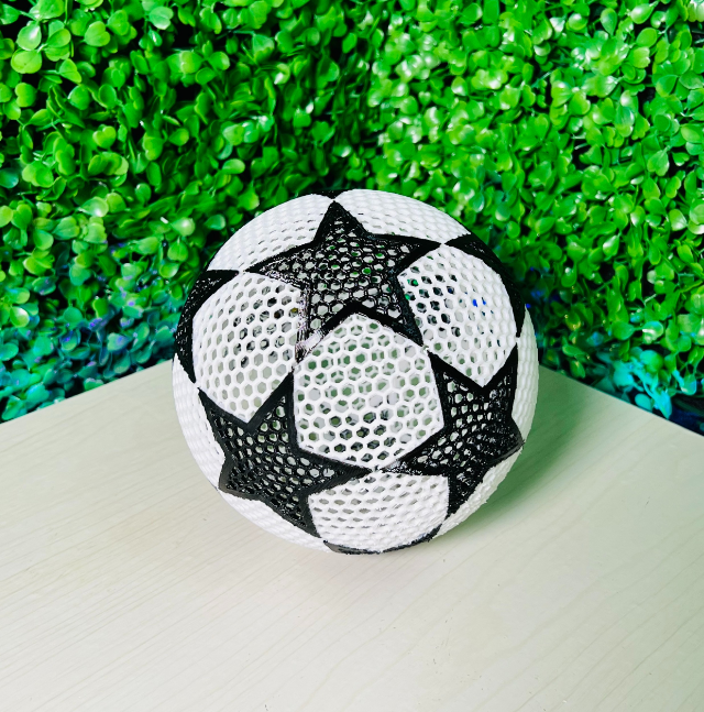 White and black star-patterned airless soccer ball, designed for durability and indoor play, ideal for soccer fans and a unique thing to 3D print when bored.