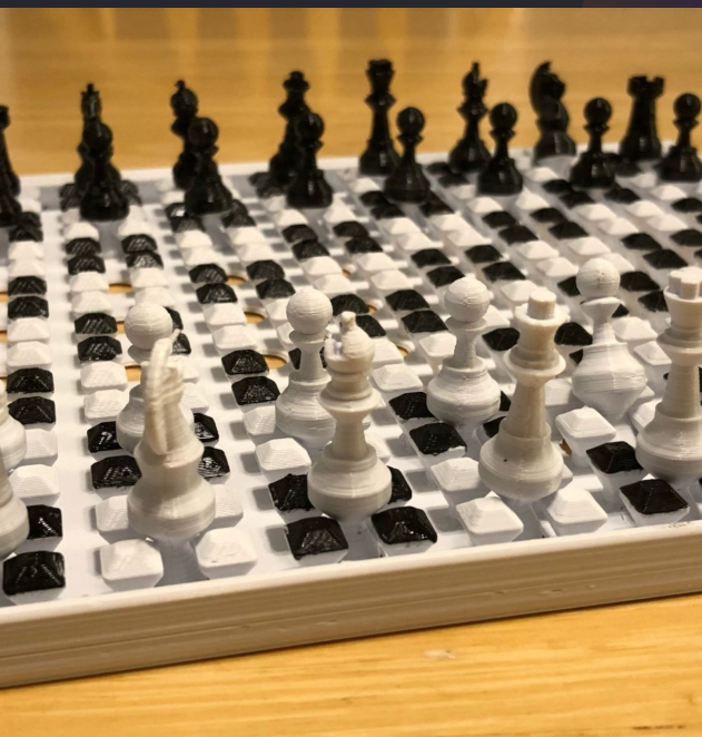 A 3D-printed chess set featuring a unique board design with black and white squares and intricately crafted chess pieces. The lightweight and modern aesthetic make this set perfect for enthusiasts and collectors alike.