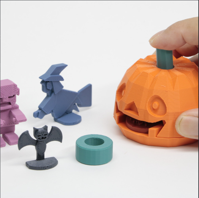 A fun Halloween-themed 3D-printed pumpkin head with an interactive design.