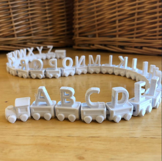 A 3D printed alphabet train.
