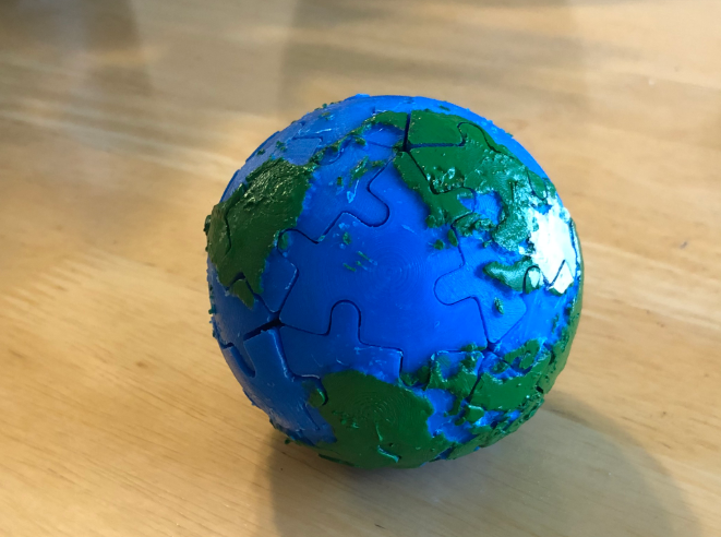 A 3D printed earth puzzle.